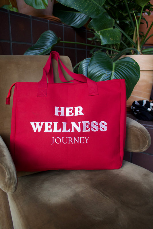 Red HerWellness Travel Bag + BLANK STREET Gift Voucher